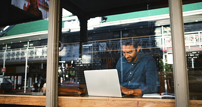 Buy stock photo Coffee shop, laptop and businessman by window in cafe for typing report, proposal and research. Restaurant, freelance and person on computer for internet, online project and review for remote work