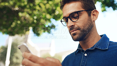 Buy stock photo Businessman, typing and phone with glasses in city for communication or social media. Man, employee or travel with mobile smartphone for network, online chatting or texting app in an urban town