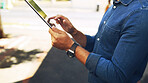 Man, hands and browsing with tablet in city street  for research, social media or communication. Male person, scrolling and connection with technology for network, news or UI app in an urban town