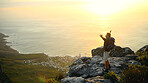 Ocean, mountains and man with arms raised, nature and excited with fitness, challenge or break. Environment, hiker and person with happiness, exercise or seaside with energy, celebrate or achievement