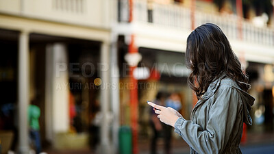 Buy stock photo Typing, internet and woman in city, smartphone and message to contact, texting and email. Outdoor, person and mobile user with cellphone, social media and connection with communication or New Orleans