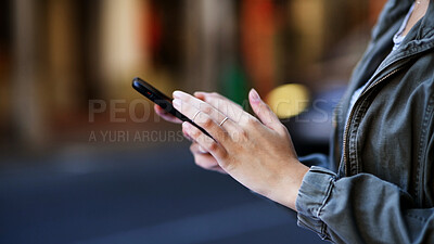 Buy stock photo Phone, hands and woman in city with networking, contact or social media blog for travel. Technology, communication and female person with cellphone for text on mobile app in urban town for holiday.
