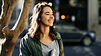Happy woman, tourist and travel in city street for funny sightseeing, adventure or outdoor journey. Female person, photographer or tourism with smile for new destination or location in an urban town