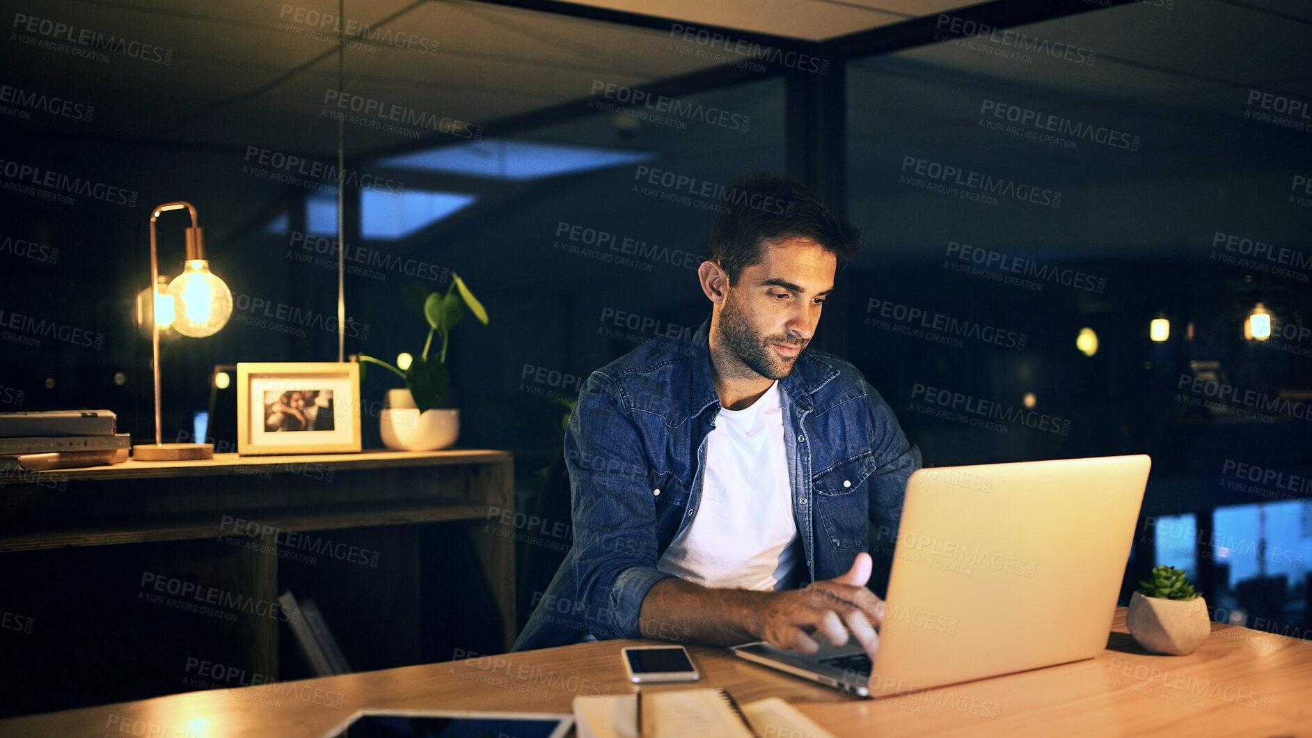 Buy stock photo Office, night and businessman with laptop for editing, proofreading and website for news article. Late, male person and journalist with digital for blog deadline, typing story and online publication