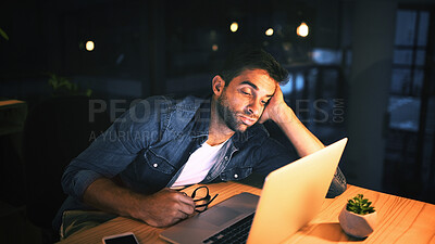 Buy stock photo Laptop, bored and business man in night office for research, copywriting deadline or project. Tired worker, frustrated and editor with fatigue, burnout or exhausted for editing news article online
