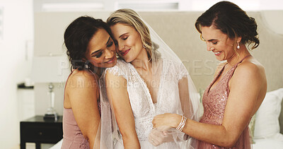 Buy stock photo Hug, wedding and friends with bride in bedroom for celebration, support and bridal party. Love, marriage ceremony and bridesmaids or women in home for getting ready, tradition and happiness for event