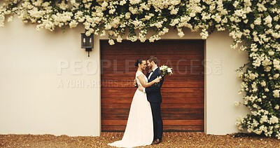 Buy stock photo Wedding, ceremony and couple with hug outdoor for marriage commitment, milestone and loyalty. Relationship, happy people and embrace by home for celebration, romance and union of love with support