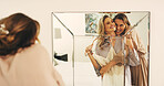 Wedding, dress and hug with women in mirror for celebration, support and excited. Love, marriage ceremony event and getting ready with friends in bedroom of home for reflection, bride and happiness