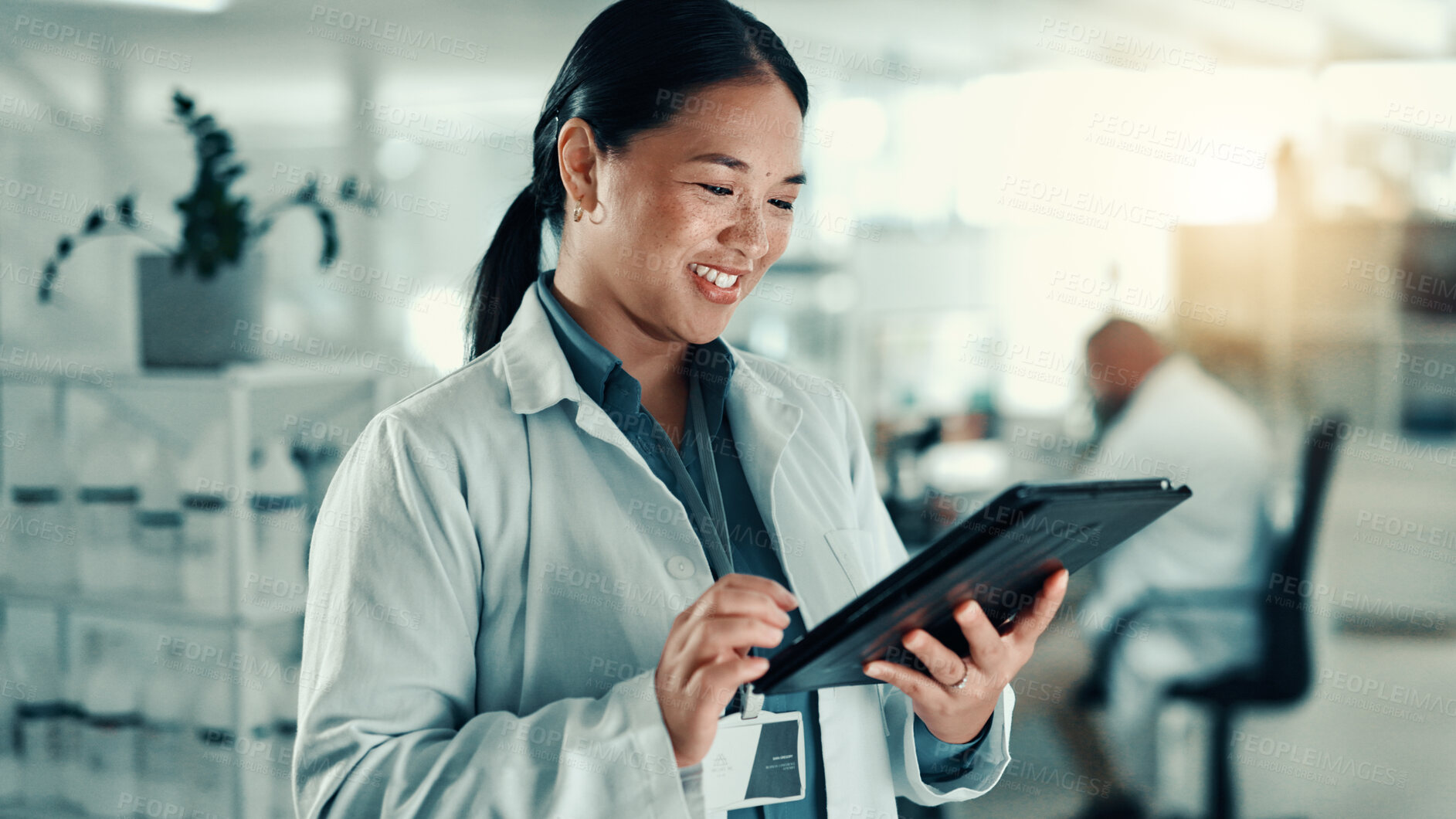 Buy stock photo Scientist, woman and typing with tablet at lab for progress report, review and happy for medical research. Person, smile and digital touchscreen with application for results for pharmaceutical study