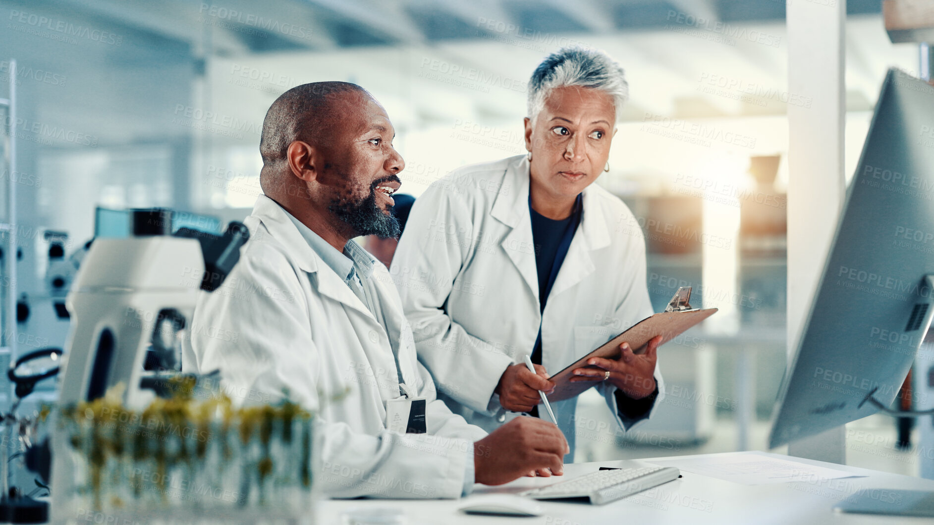 Buy stock photo Collaboration, computer and medical with science people in laboratory for development or research. Healthcare, innovation or teamwork and mature scientist team at desk with clipboard for breakthrough