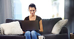 Sofa, woman and smile with laptop for freelancer, online information and blog editing for website. Home, female person and content writer with technology for remote work, article research and typing
