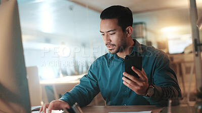 Buy stock photo Night, computer and man with smartphone, typing and email for proposal, proofreading and deadline. Evening, person and journalist in workplace, cellphone or pc with internet, website info or research