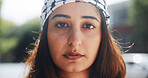 Portrait, woman and outdoor with keffiyeh scarf for islamic culture, Eid Mubarak and traditional. Person, fabric and solidarity for Palestine resistance, political awareness and protest for freedom