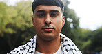 Portrait, man and proud with keffiyeh scarf for islamic culture, Eid Mubarak and traditional. Person, fabric and solidarity for Palestine resistance, political awareness and protest for Gaza freedom