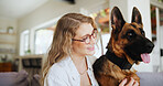 Happy, woman and dog in living room, hug and affection for german shepherd, love and domestic canine. Home, owner and person with rescue animal in lounge, embrace and care for companion with loyalty