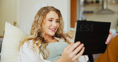 Buy stock photo Happy woman, relax and sofa with tablet for entertainment, online subscription or streaming at home. Female person, user or smile with technology on couch or break for movie, series or show at house