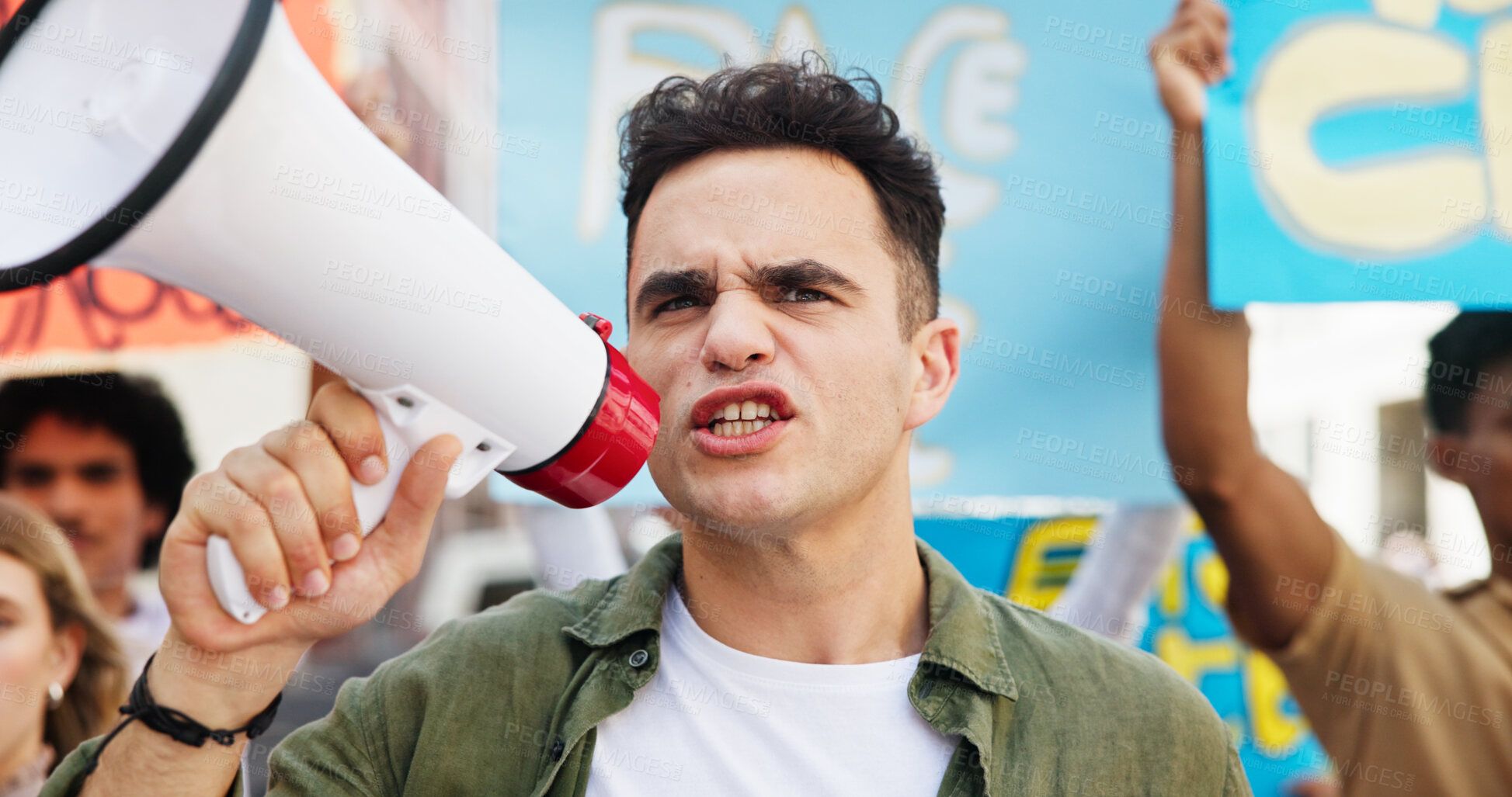 Buy stock photo Community, shouting and man with megaphone in street for inflation, human rights or cost of living. Speaker, strike and people in protest with bullhorn for rally, justice or higher wages for change