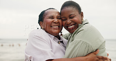 Buy stock photo Smile, mother and daughter with hug on beach for travel, summer holiday and getaway. African family, laugh and embrace with mature woman, tropical vacation and bonding together for affection on trip