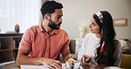 Finance, paperwork and couple in home talking for budget review, savings and payment invoice for mortgage. Marriage, accounting and man with woman with documents, bills and financial expenses for tax