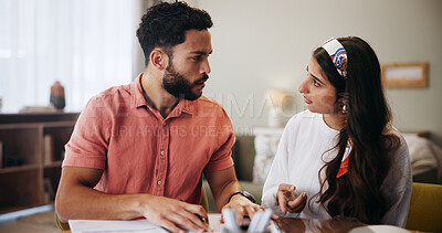 Buy stock photo Finance, paperwork and couple in home talking for budget review, savings and payment invoice for mortgage. Marriage, accounting and man with woman with documents, bills and financial expenses for tax