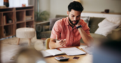 Buy stock photo Finance, accounting and man in home with paperwork for budget planning, savings and investment. Thinking, reading and person with documents, bills and invoice for financial review, taxes and report