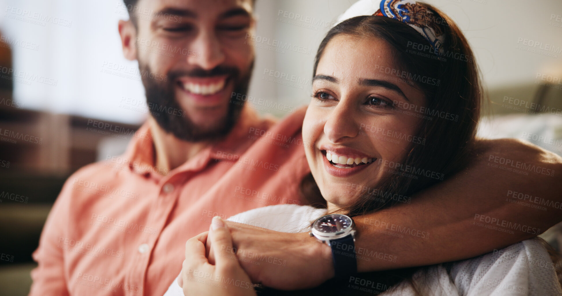 Buy stock photo Hug, happy couple and smile in living room with love, bonding and weekend date in apartment. Embrace, man and woman in house for marriage relationship, laugh or funny joke in home lounge for break