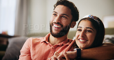 Buy stock photo Couple, happy and watching tv on sofa with hug, relax and bonding with movie in living room at house. People, man and woman with holding hands, care and streaming with film subscription at apartment