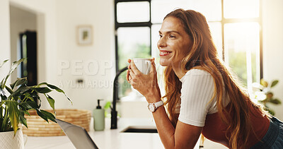Buy stock photo Thinking, laptop and woman with coffee, kitchen or planning for article on social media or creative. Daydreaming, blogger and person with caffeine in morning, smile and tech for remote work in house