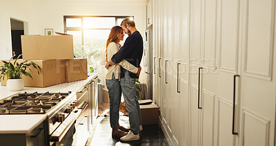 Buy stock photo Couple, love and hug with boxes at new house for relocation, investment and bonding together. People, embrace and affection, moving property and relationship commitment with security of home purchase