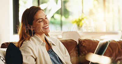 Buy stock photo Tablet, happy woman and relax in home on internet for streaming movie, show and watch drama online. Technology, smile and person reading ebook in living room, news and check social media on weekend