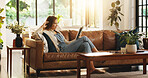 Tablet, smile and woman relax in home for streaming movie, show and watch drama online. Technology, happy person and reading ebook on internet in living room, news and check social media on weekend