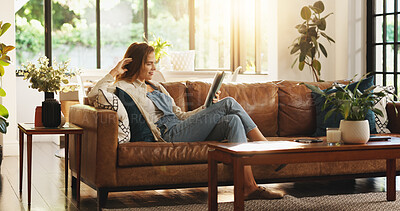Buy stock photo Tablet, smile and woman relax in home for streaming movie, show and watch drama online. Technology, happy person and reading ebook on internet in living room, news and check social media on weekend