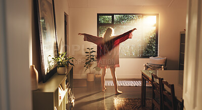 Buy stock photo Back, woman and stretching arms by window in home for freedom, peace and ready to start day in house. Sunshine, good morning and person with view for wake up, flare and fresh with energy on weekend