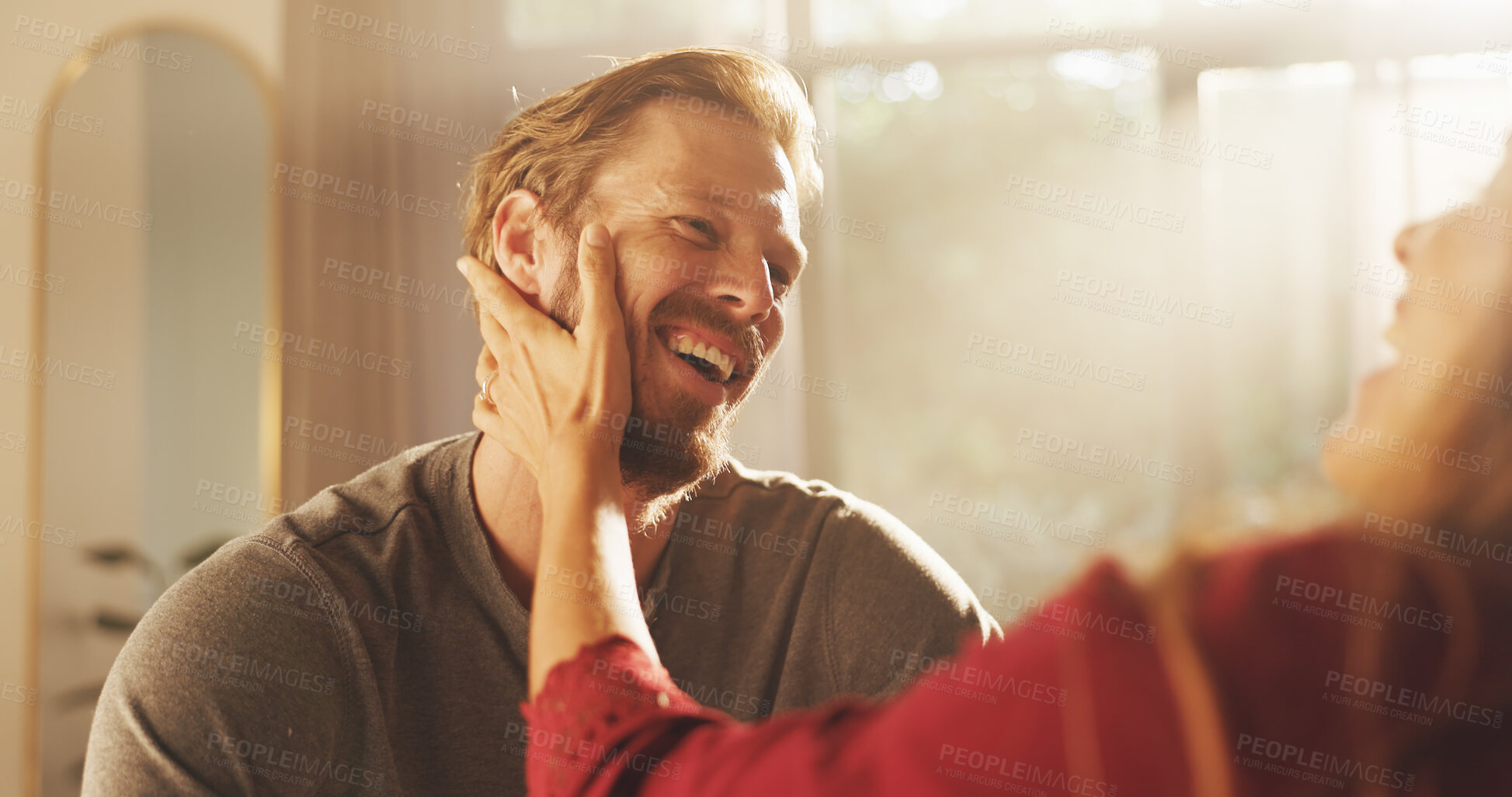 Buy stock photo Home, love and couple with smile, funny and bonding together in living room. People, apartment and man with woman, relationship and joke with support, marriage and romance with affection or laughing