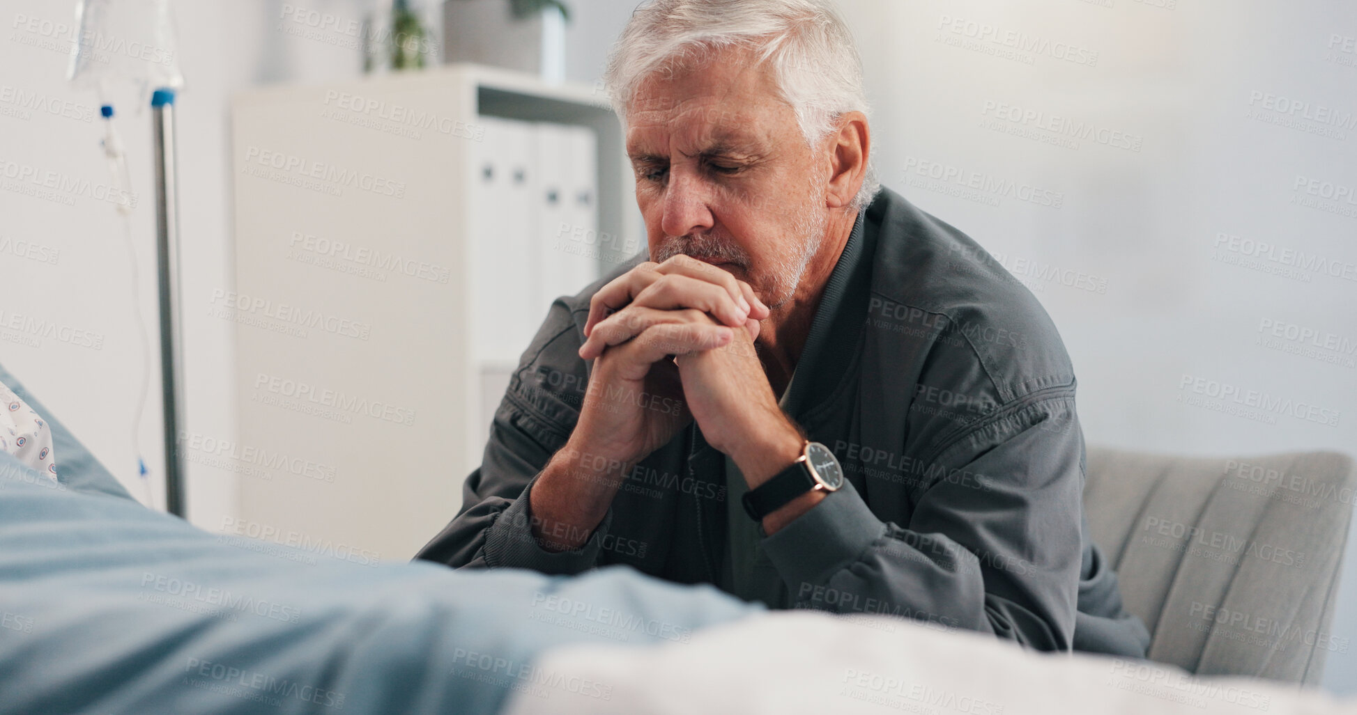 Buy stock photo Hospital bed, couple and senior man with hope, healthcare and prayer for recovery of partner or sad. Clinic, worried and elderly person with concern for cancer, sick and medical treatment for patient
