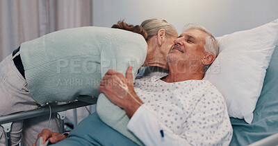 Buy stock photo Senior couple, hug and kiss in hospital bed for care, love or support for healing in retirement. Elderly people, man and woman with kindness for trust, loyalty and patient in rehabilitation at clinic