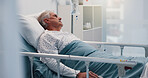 Sick, thinking and senior man in hospital bed, recovery and stress in emergency room. Pensioner, elderly patient and old person in clinic for surgery, cancer treatment and healthcare with reflection