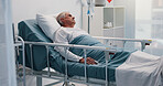 Sick, healthcare and senior man in hospital bed, thinking and stress in emergency room. Pensioner, elderly patient and old person in clinic for surgery, cancer treatment and healing with recovery