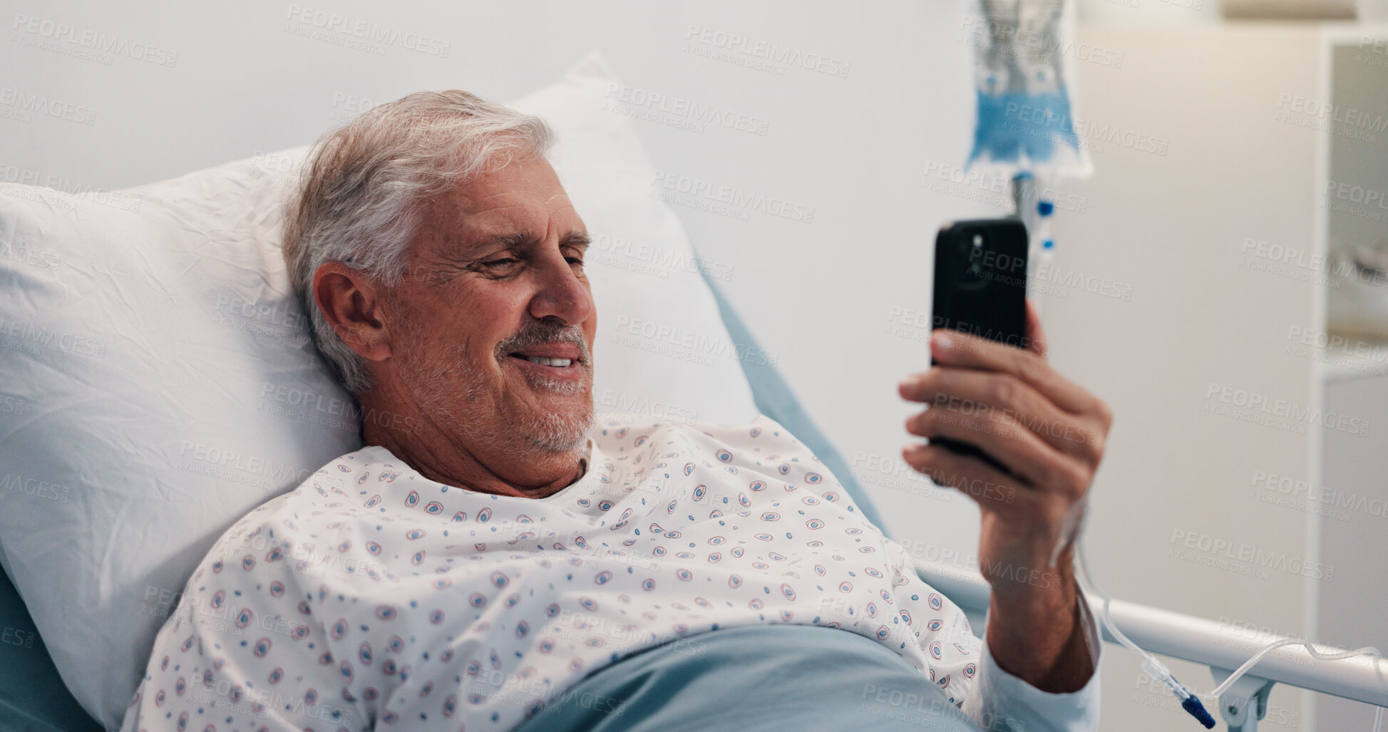 Buy stock photo Hospital, old man and happy with phone in bed for video call, medical update and health recovery. Healthcare, senior patient and smile with smartphone in clinic for virtual conversation or connection