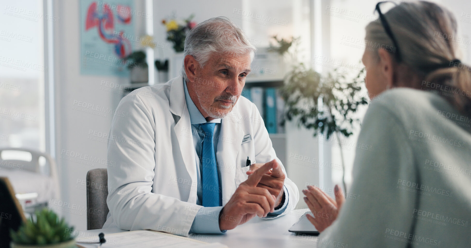 Buy stock photo Doctor, mature woman and advice in clinic for medical services, consultation or opinion. People, symptoms and patient in conversation for appointment, checkup and healthcare with treatment discussion