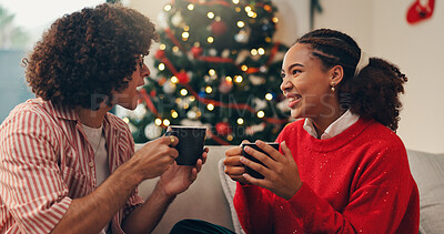 Buy stock photo Christmas, home and couple on sofa, coffee and bonding together with festive season. Apartment, man and woman on couch, eggnog and tradition with love, Xmas and conversation with celebration and tea