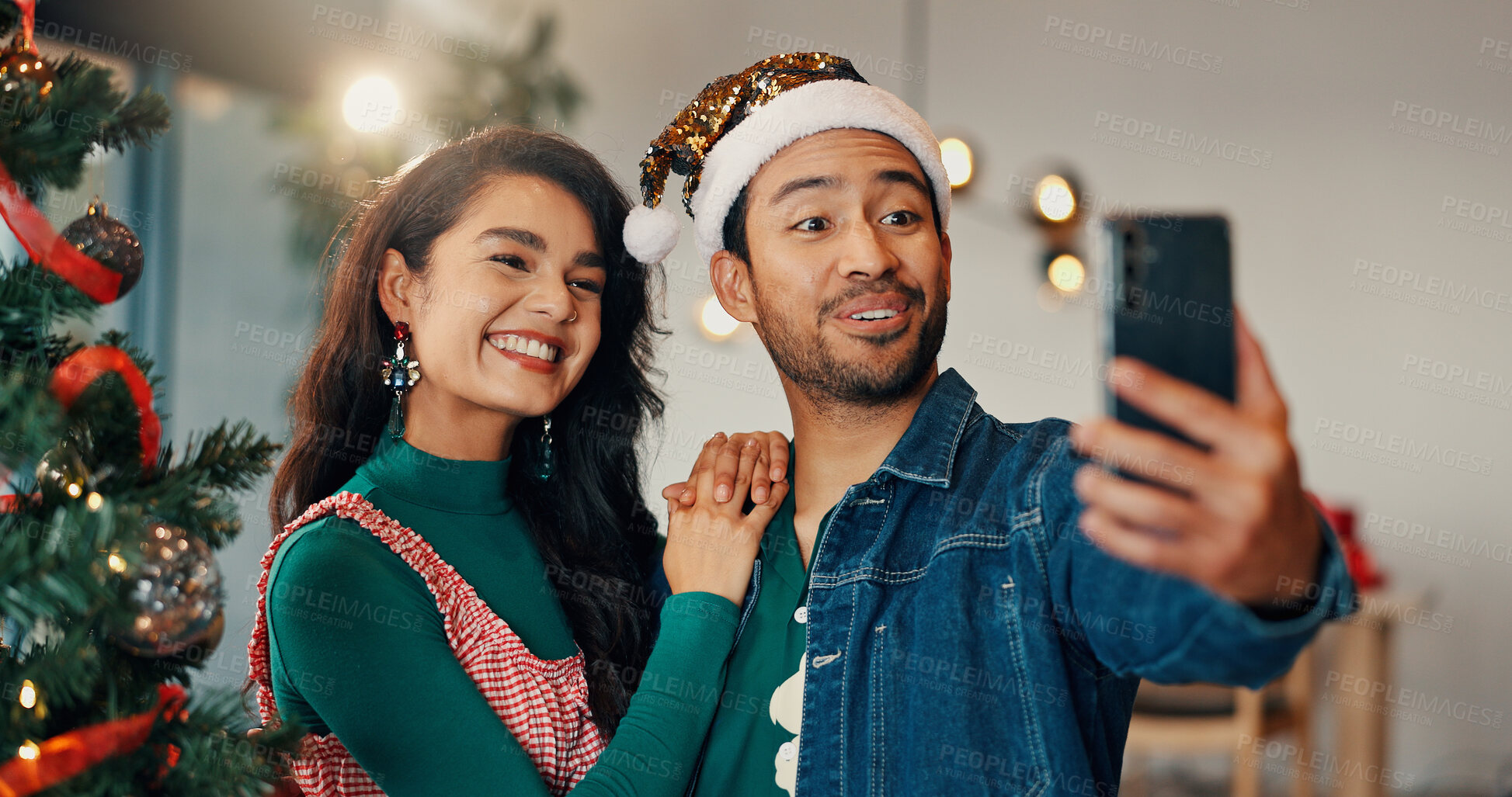 Buy stock photo Christmas, selfie and social media with couple in home living room for celebration together. December, holidays or smile of man and woman in apartment for memory, photograph or profile picture