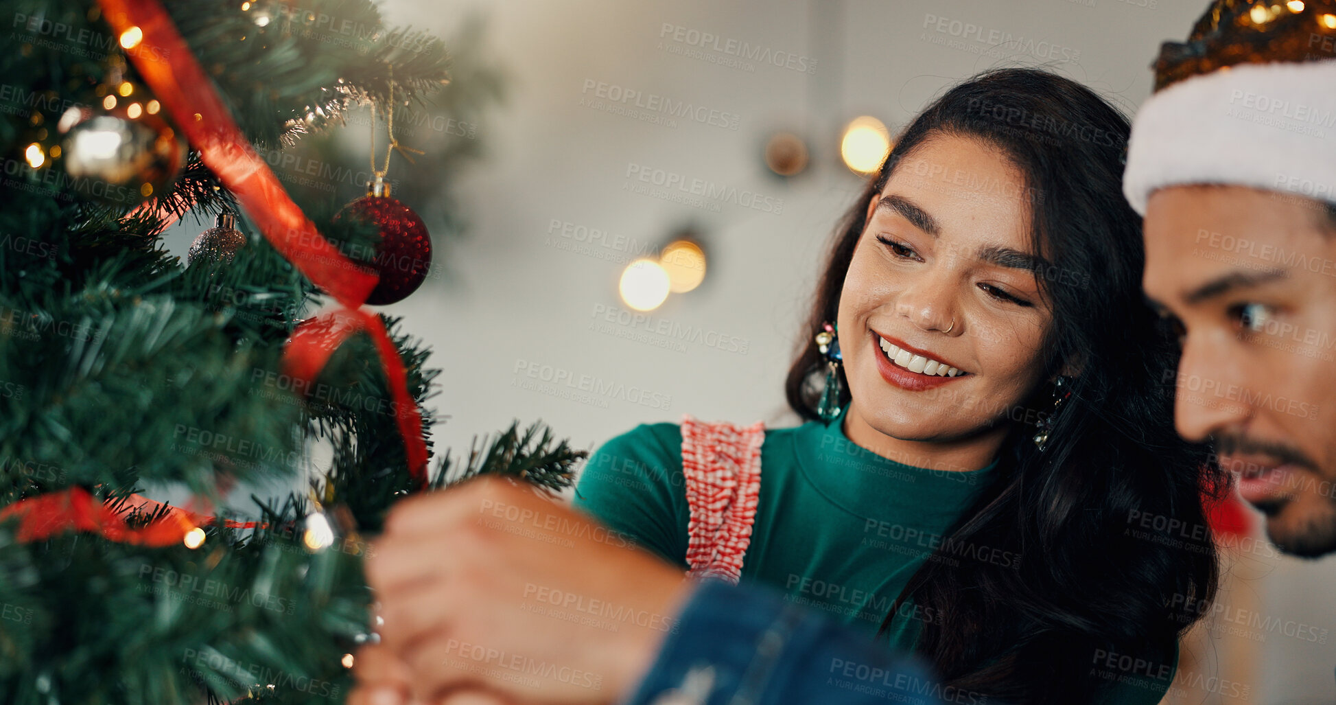 Buy stock photo Christmas, home and couple with tree, help and bonding together with love, romance and relationship. Happy people, apartment and man with woman, Xmas and marriage with celebration, tradition or smile