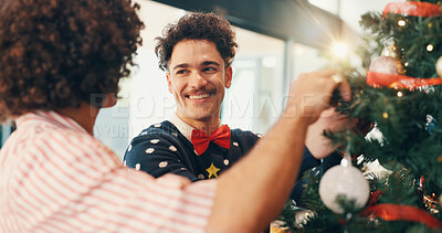 Buy stock photo Christmas, smile and men with tree, help and bonding together with festive season. People, apartment and friends with Xmas event, home or celebration with tradition, holiday and decoration with break