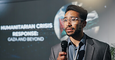 Buy stock photo Man, speech and mic at seminar event for genocide, humanitarian crisis and response. Person, public speaking and raise awareness for global oppression, stop injustice and action for war in Palestine
