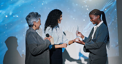 Buy stock photo Women, award and happy on conference stage, mic and giving prize for performance at company. Person, staff and trophy at event with thanks, goal and smile for reward with success in finance career