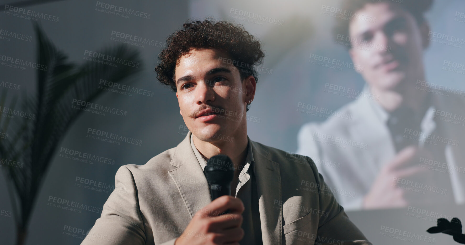 Buy stock photo Seminar, training and man with mic, speech or motivational speaker for session, serious and meeting. Stage, presenter and person with ideas for entrepreneurship, public speaking and presentation