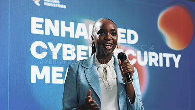 Buy stock photo Happy, black woman and speaking with mic at seminar for cybersecurity presentation or tech summit. Female person, business speaker or presenter with technology for speech, online safety or campaign