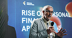 Mature, businessman and presentation with mic for convention or finance advice at seminar. Man, financial advisor or speaker with speech for business tradeshow, corporate workshop or talk at summit