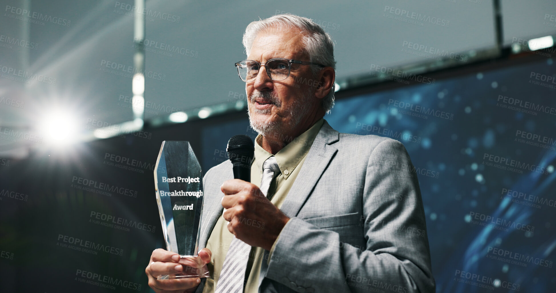 Buy stock photo Businessman, award and mic with speech at seminar for thank you, success or nomination. Mature man, executive or speaker with smile for announcement, trophy or congratulations at reward ceremony